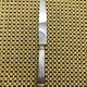 Small silver-plated Christofle knife, Aria model with gold rings