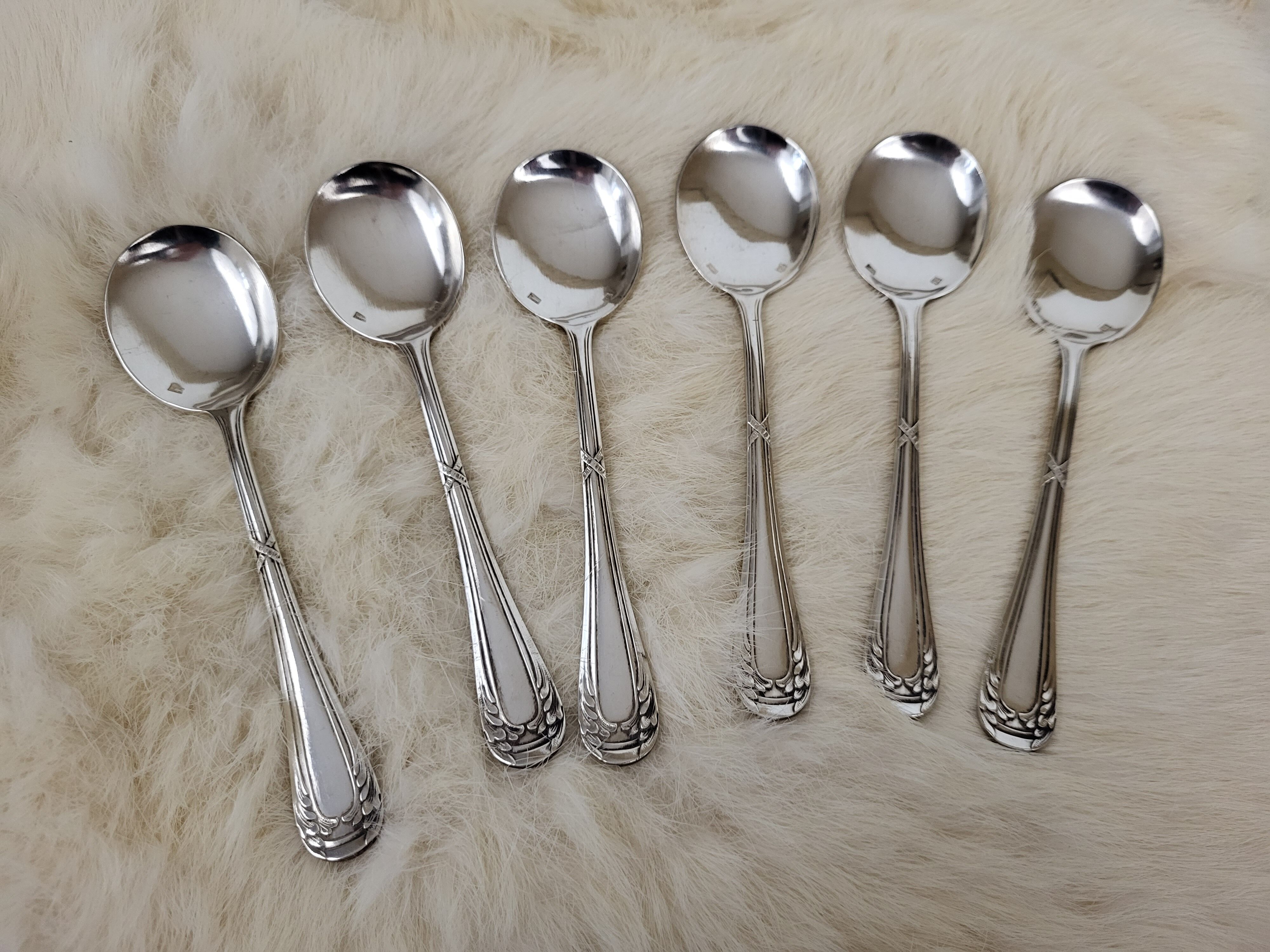 Set of 6 silver metal cream spoons