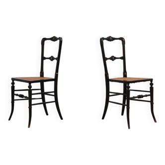 Pair of English victorian black lacquered gilt English side chairs, ca 1850