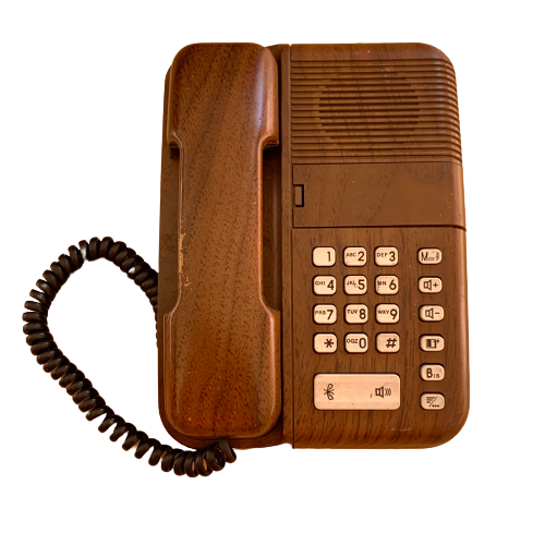 Old Thomson bakelite telephone and vintage wood