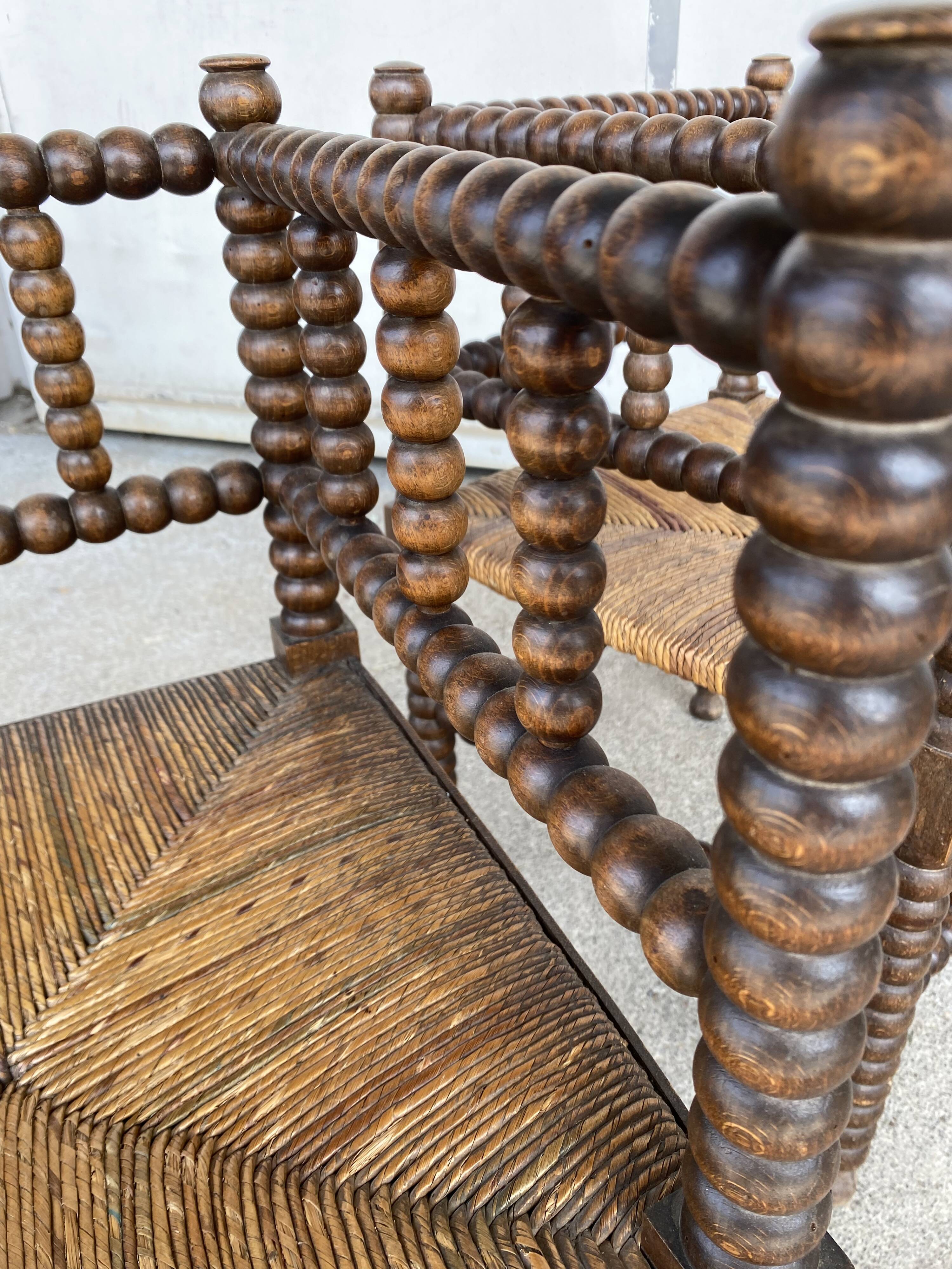 Pair of beaded armchairs