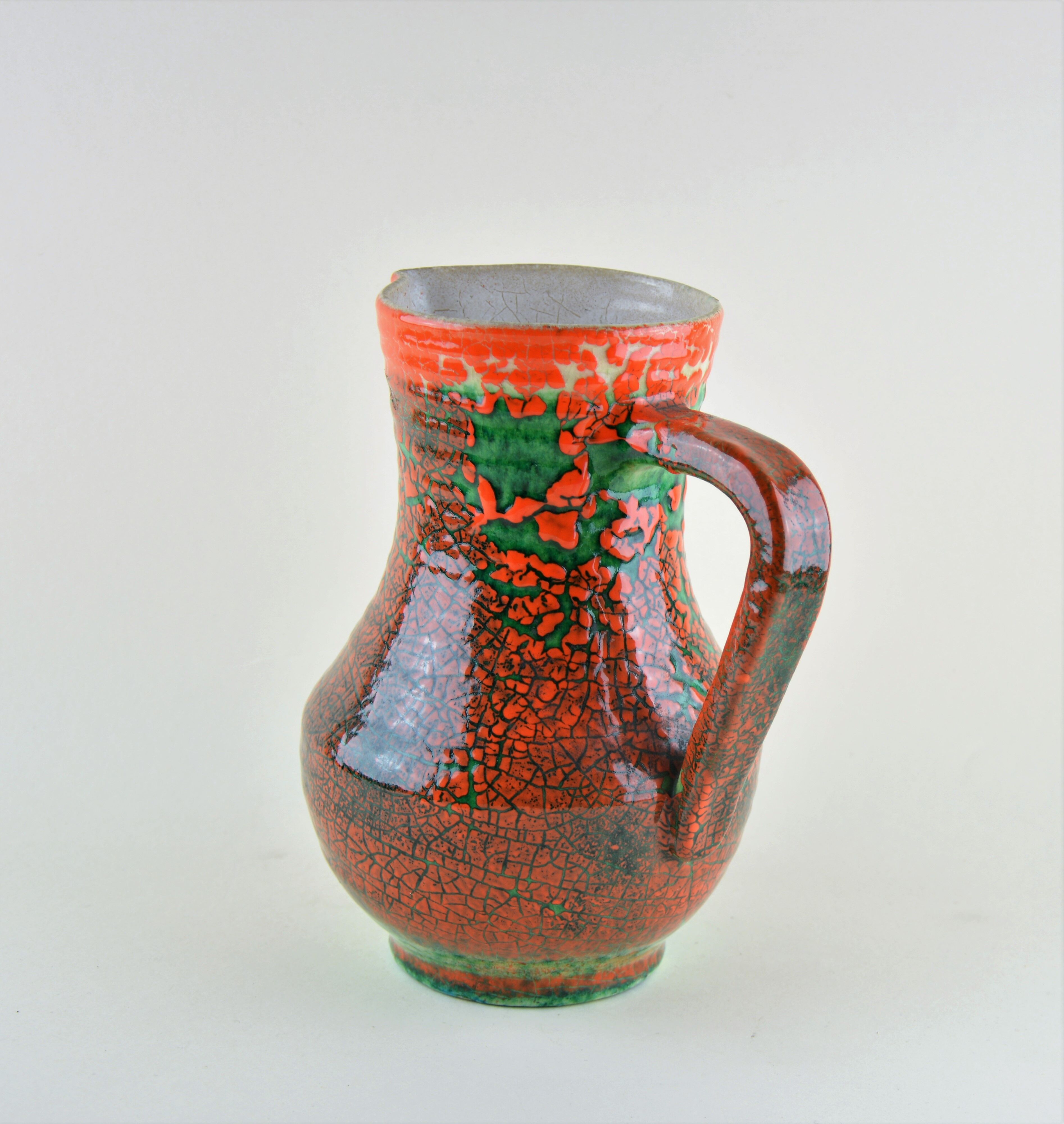 Accolay, pitcher with vibrant colors