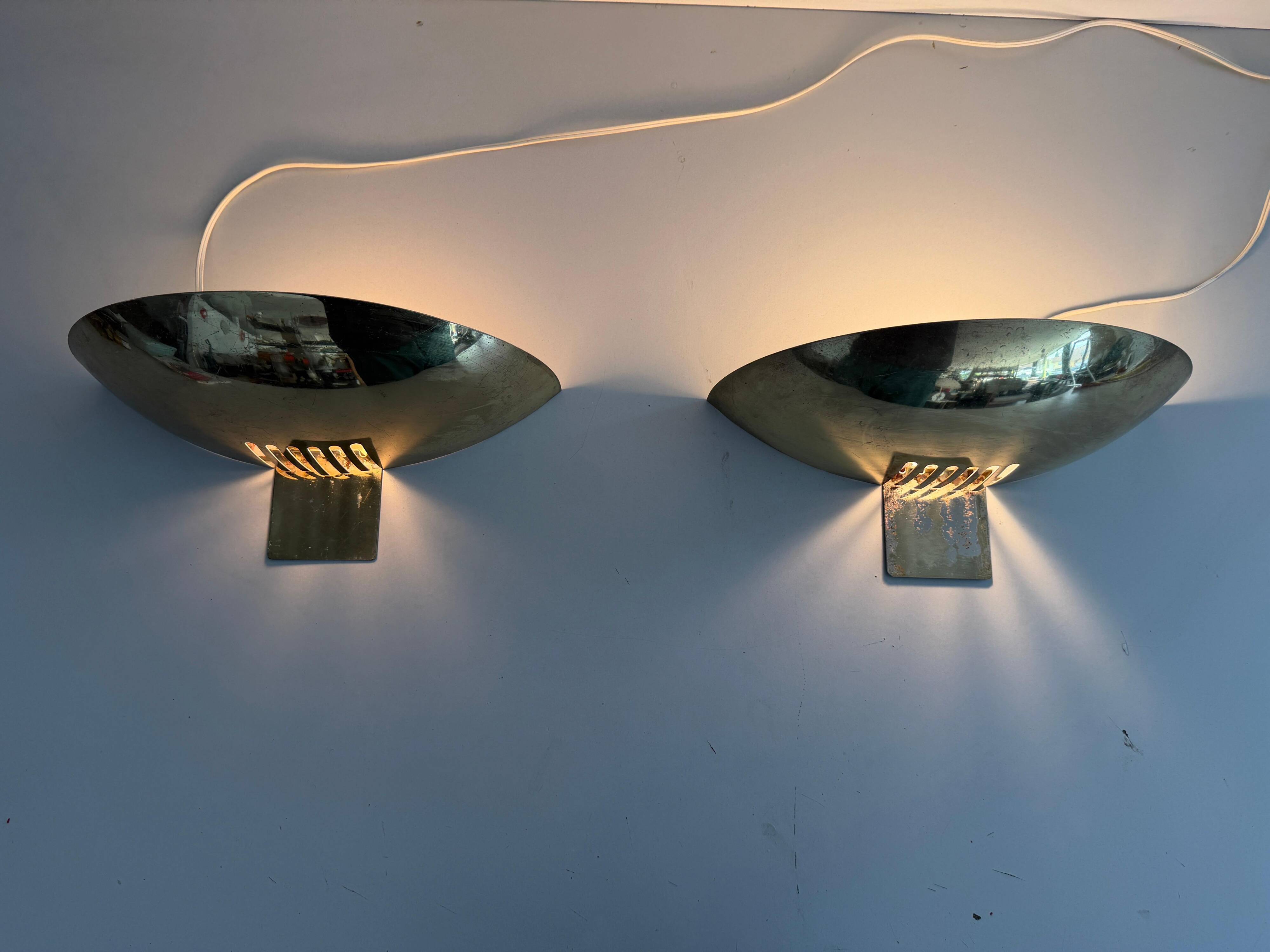 Pair of brass wall sconces from the mid-century by SCE, 1960s, France.