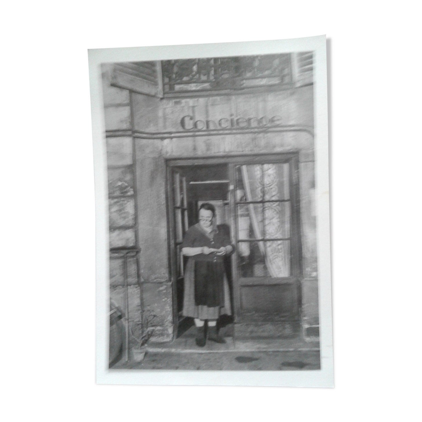 Photograph of a janitor of an old building
