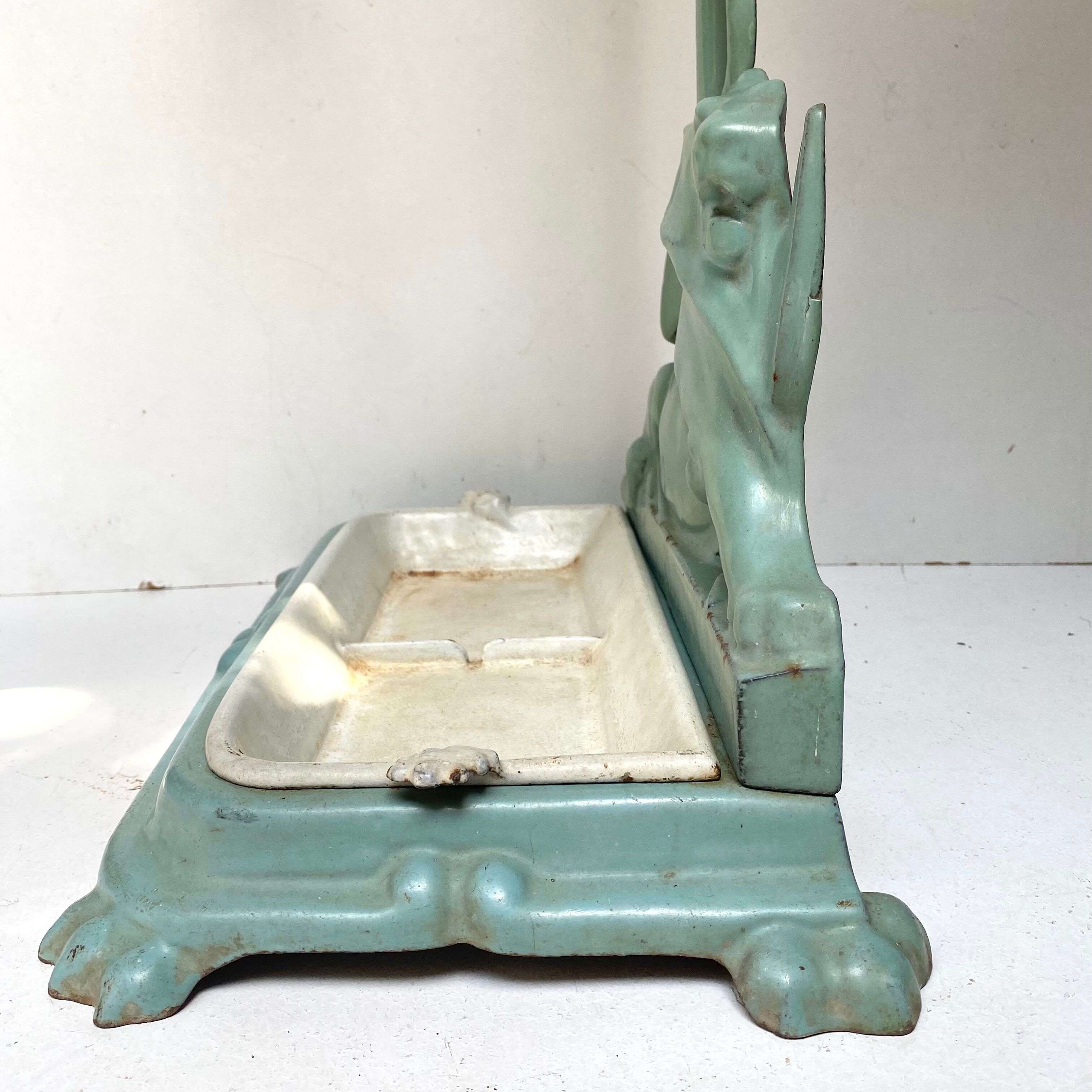 Enameled cast iron umbrella stand from the early 20th century