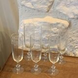 6 chiseled champagne flutes on vintage floral frieze pattern