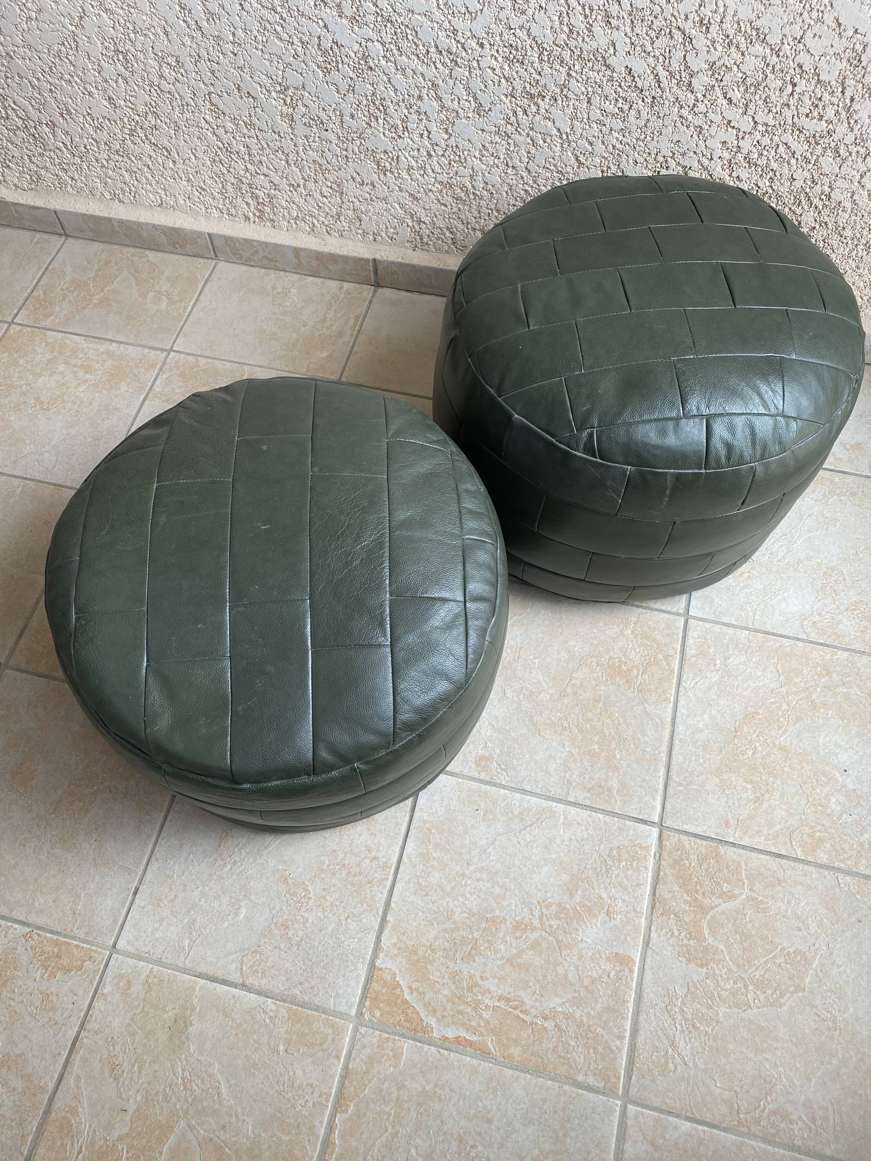 Two poufs or pieces of sofas in leather patchwork