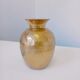 Hammered golden vase