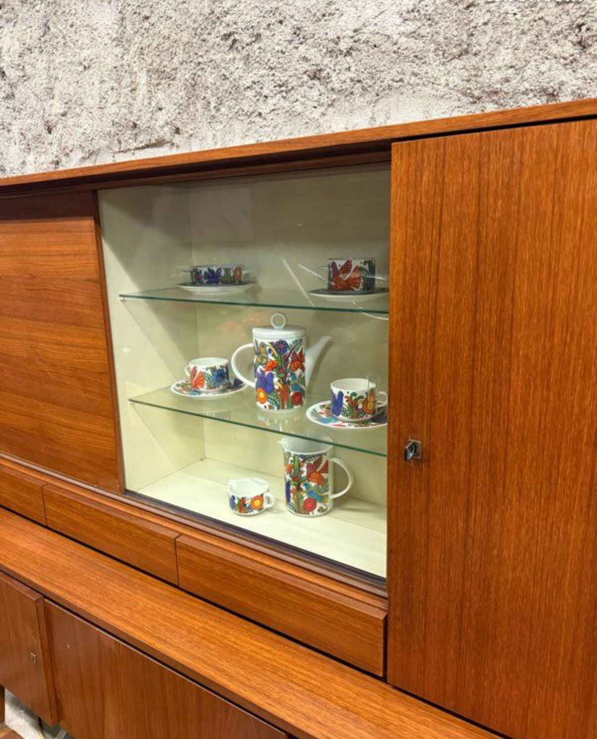 Vintage Scandinavian teak sideboard with compass feet from the 70s