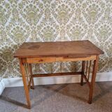 Old wooden desk with bars