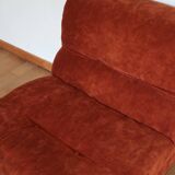 Rusty velvet low chair without arms