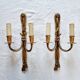Pair of French wall sconces in bronze, Louis XVI style, with cord.