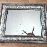 Old mercury mirror, in carved wood with silver leaf