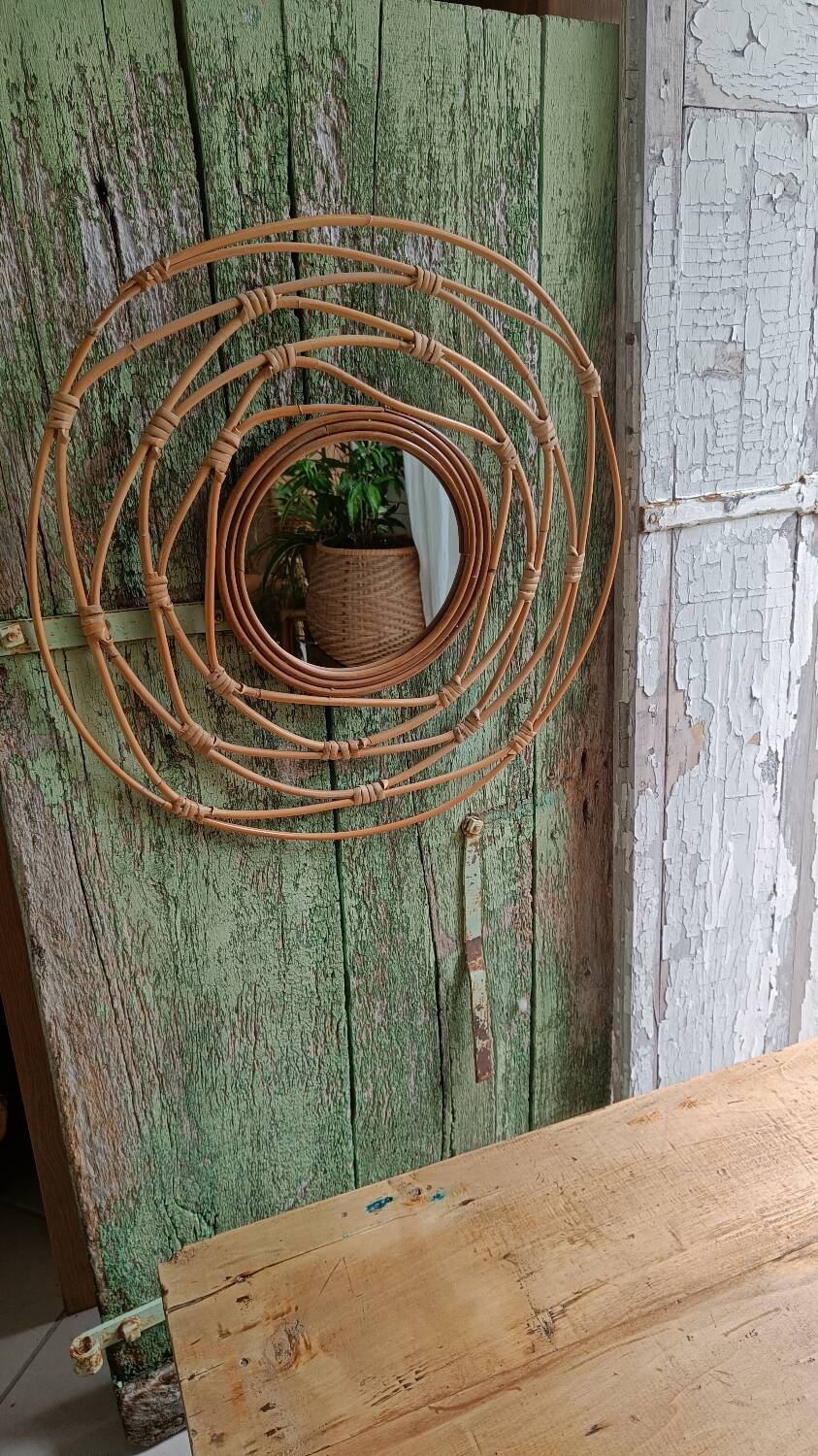 Round rattan mirror