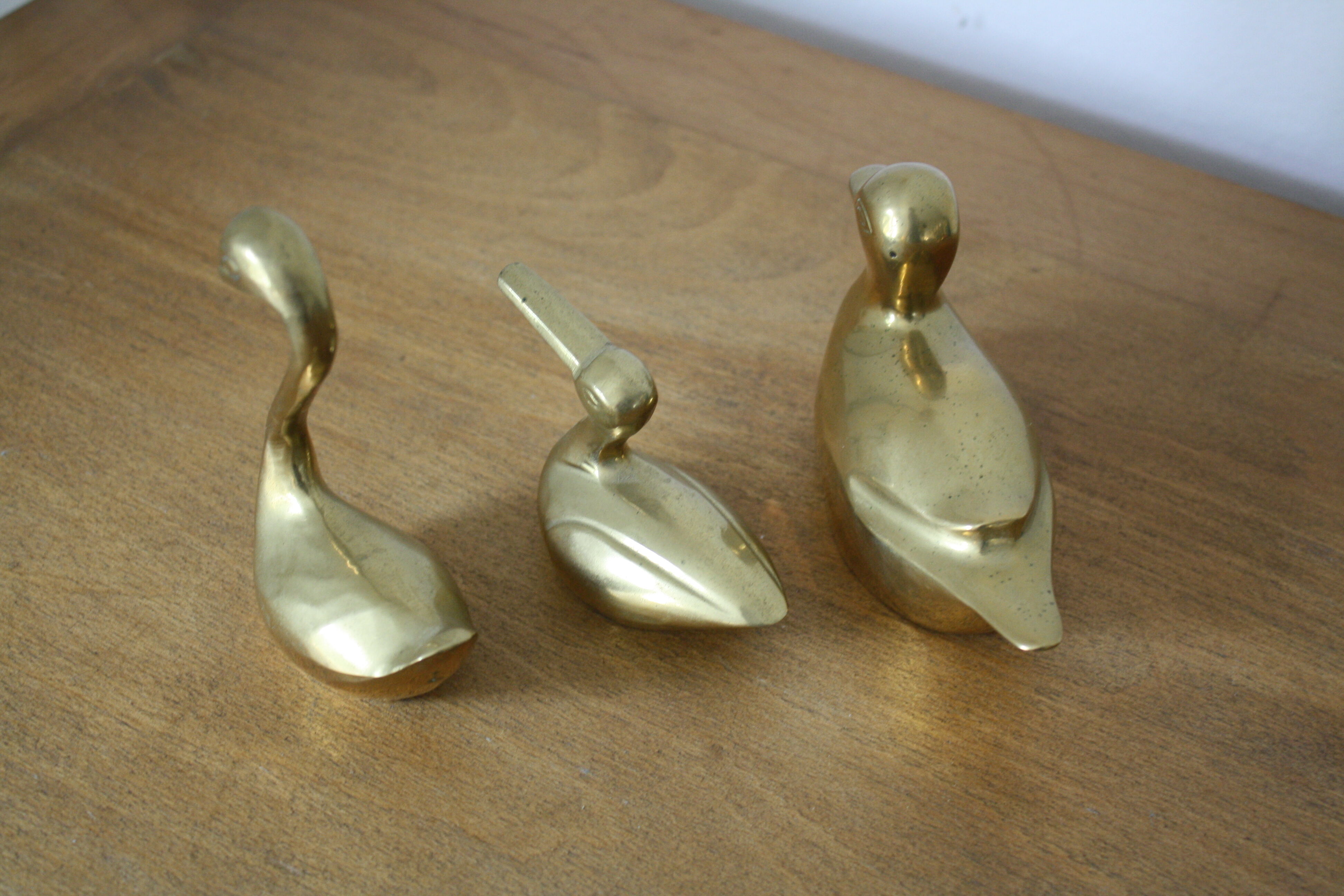Set of 2 ducks and 1 brass swan