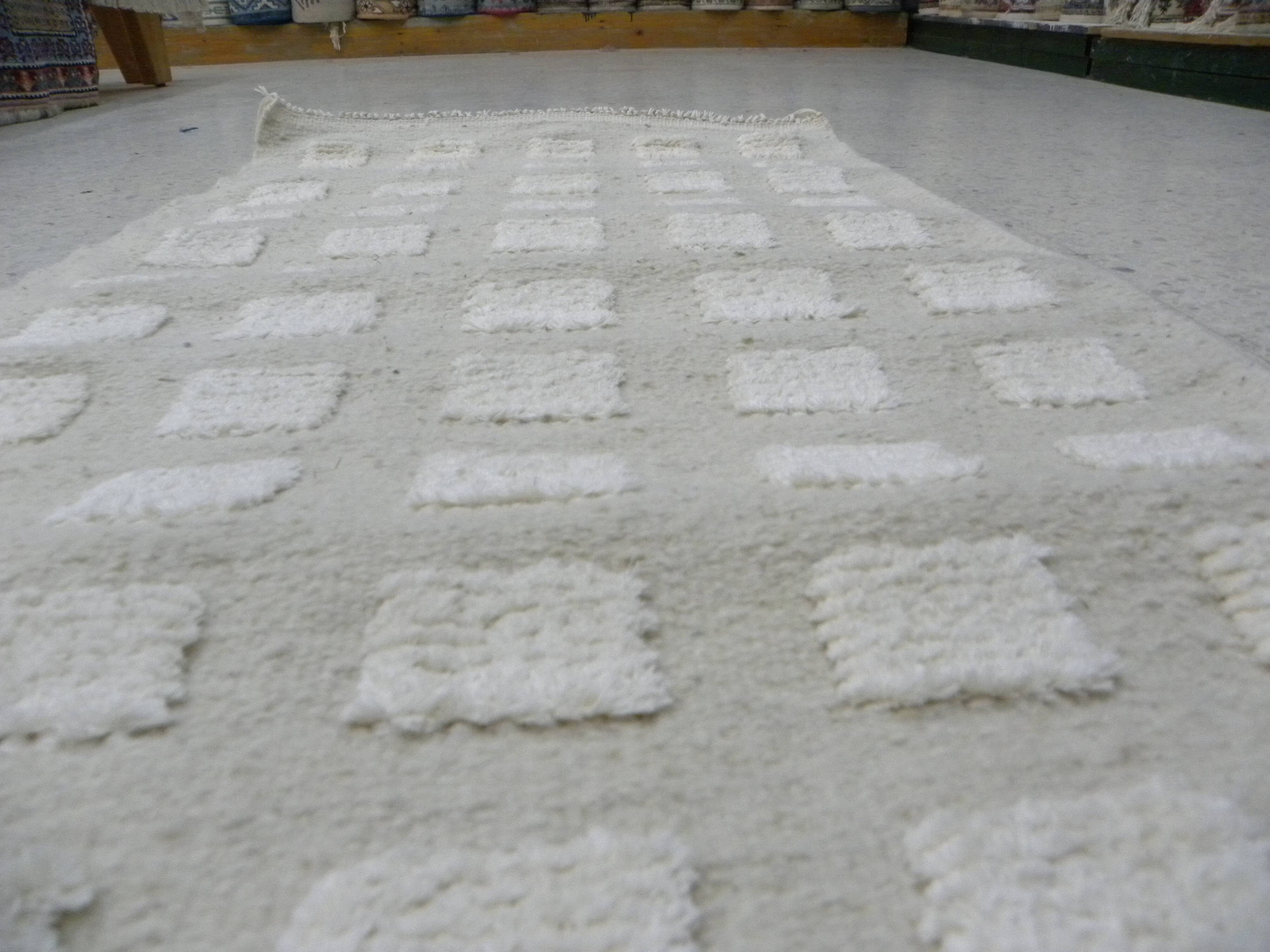 Tunisian Berber rug handwoven from pure sheep wool.