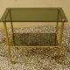 Antique brass serving trolley with smoked glass top, Louis XVI style.