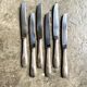 6 silver metal knives