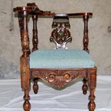 Neo-Renaissance corner armchair in carved walnut