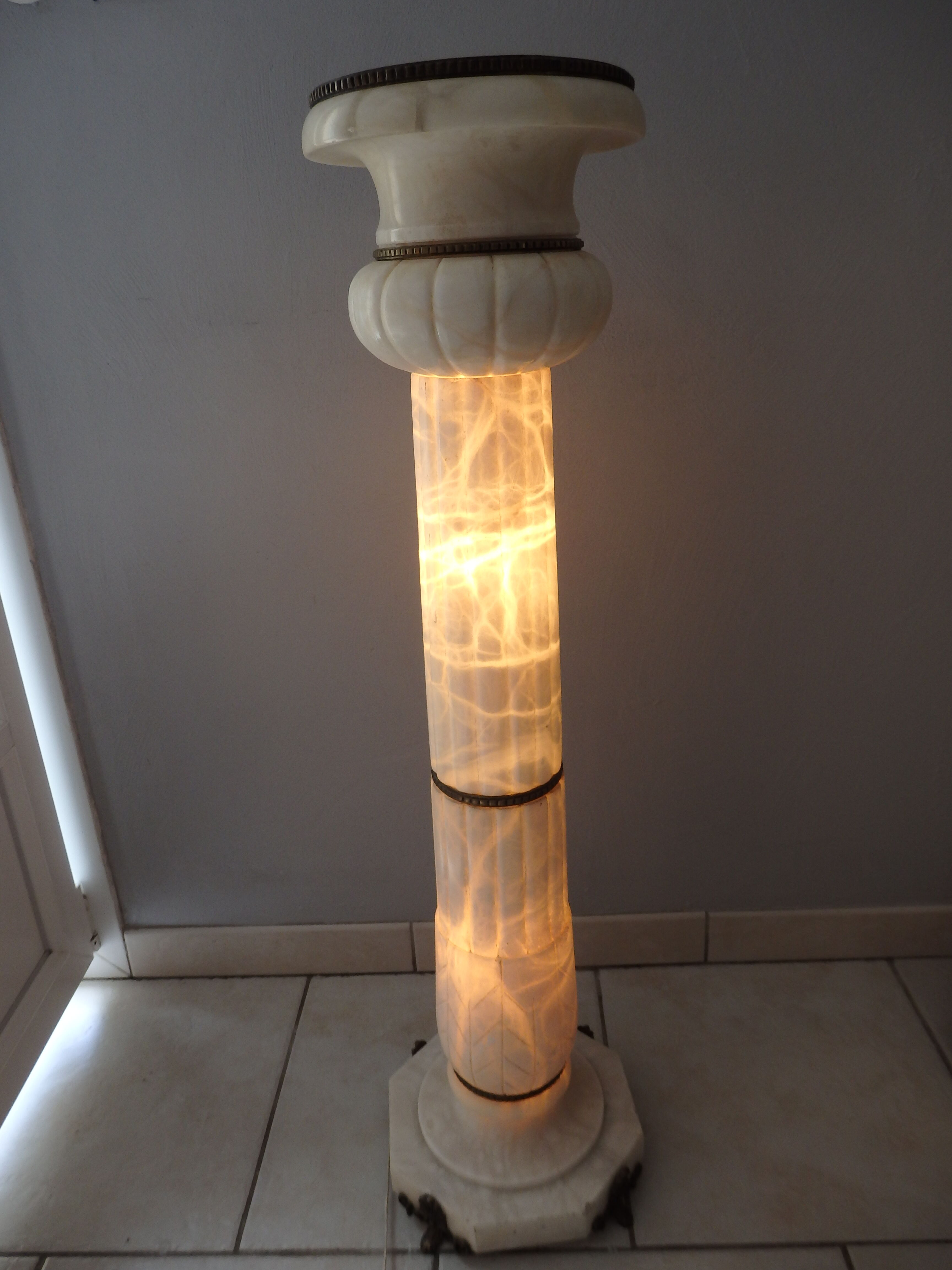 Antique luminous alabaster and bronze column