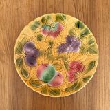 Round earthenware dish decorated with fruit in Sarreguemines slipware