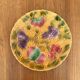 Round earthenware dish decorated with fruit in Sarreguemines slipware