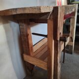 Old homemade vintage solid wood workbench with press and drawer