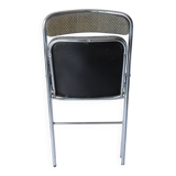 Vintage folding chair in chrome metal and chevron fabric.