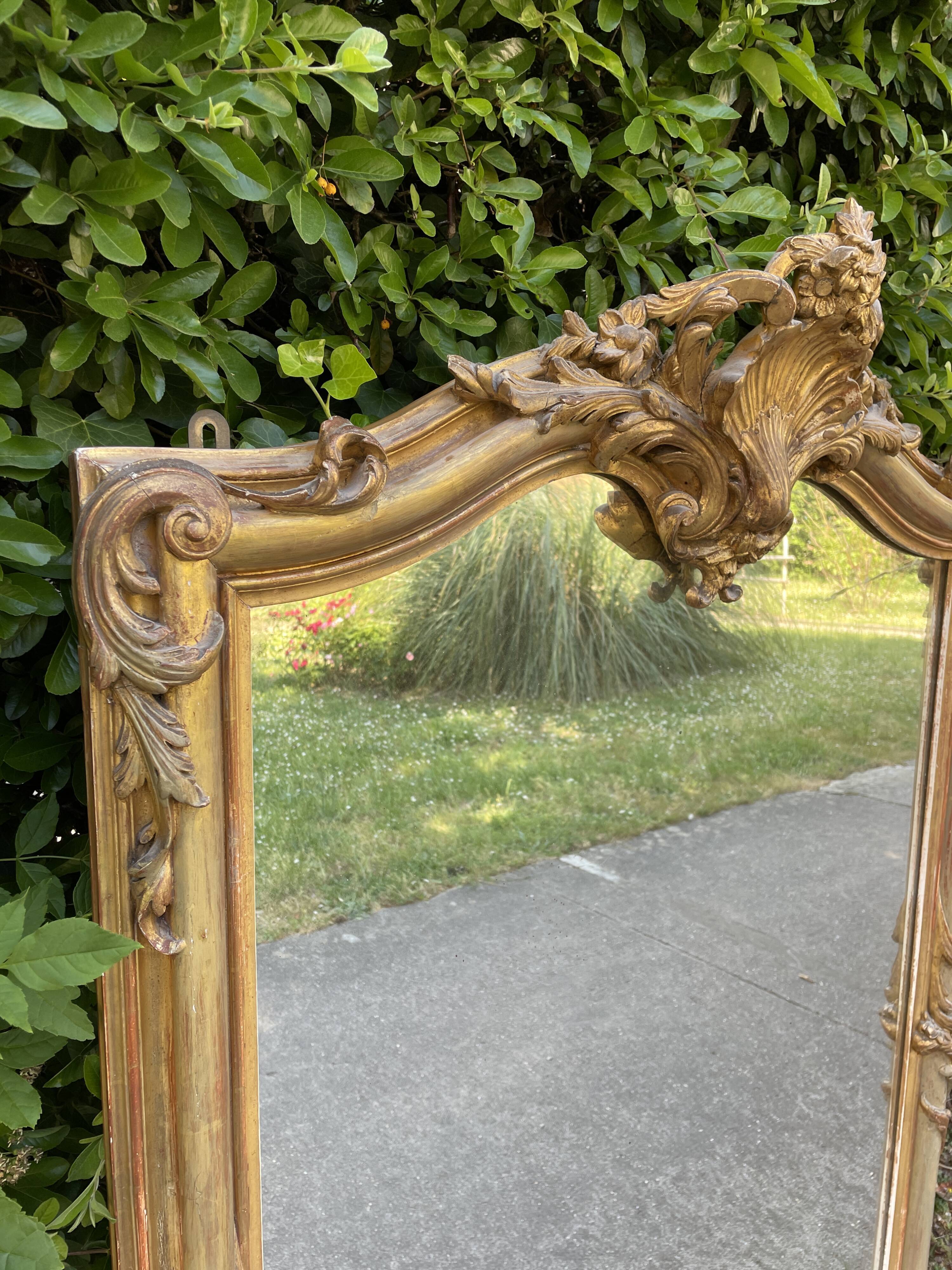Old Louis XV style mirror in wood and gilded stucco. Napoleon III