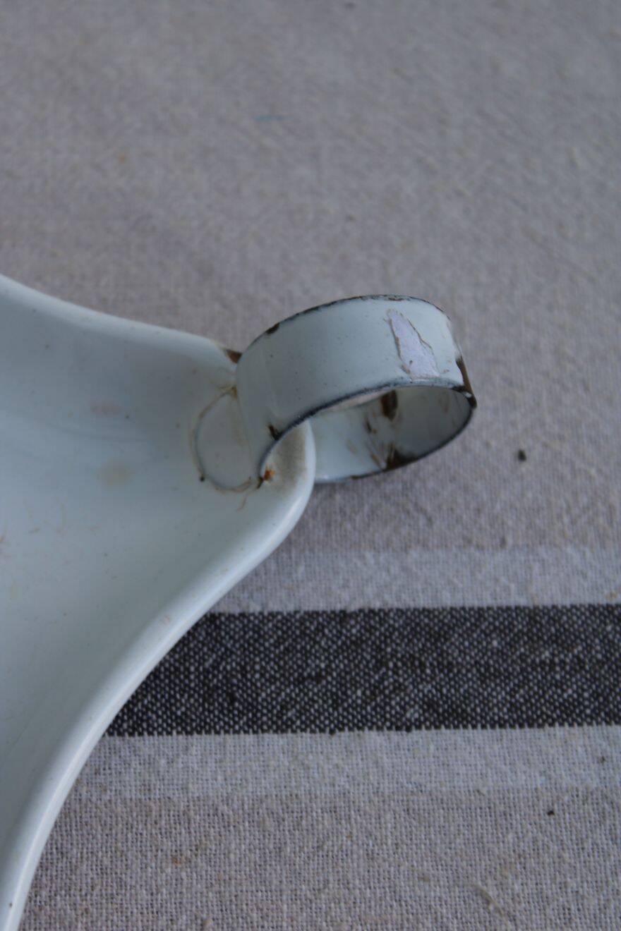 Antique enamel candle holder