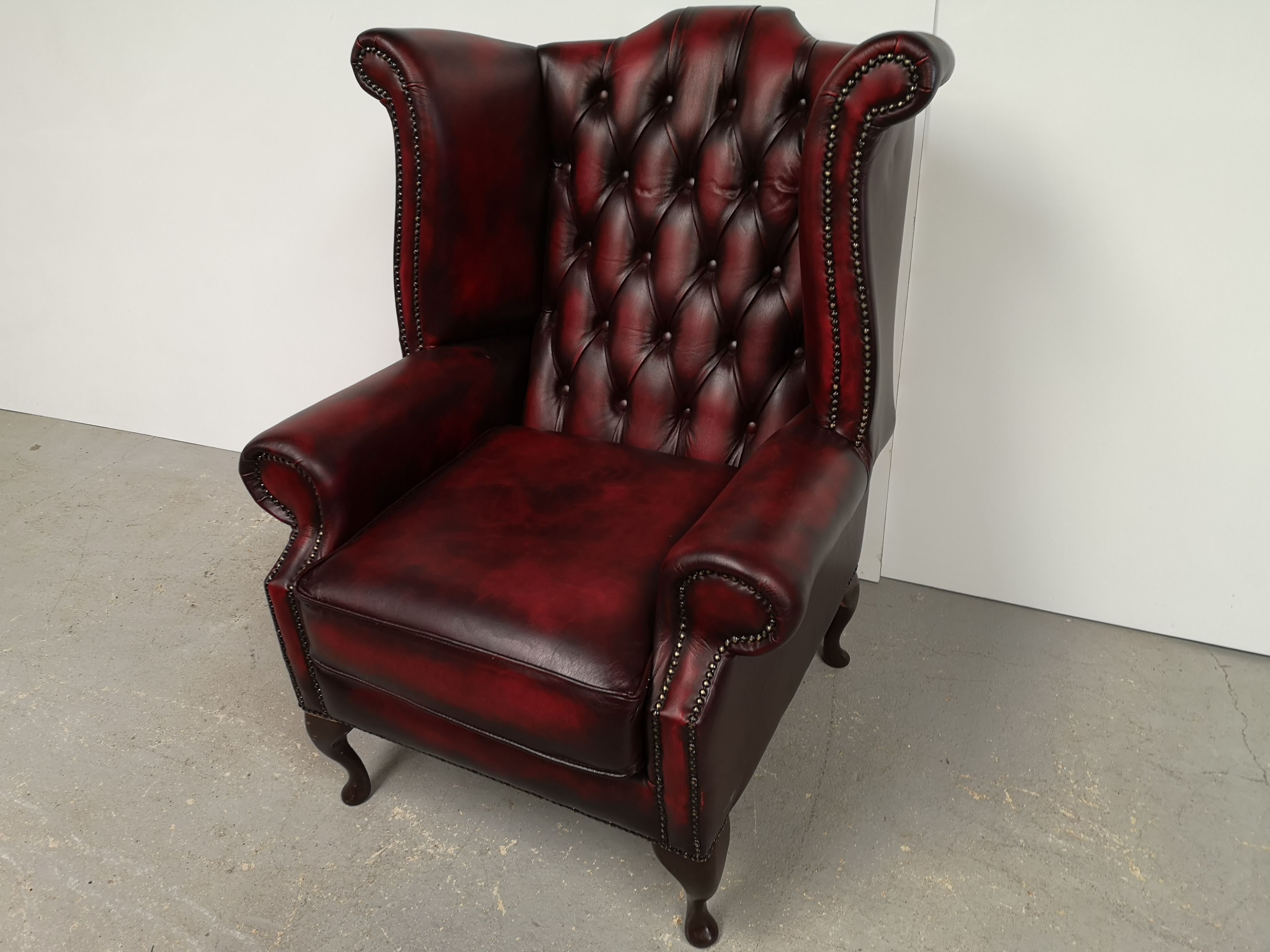 Burgundy chesterfield chair