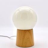 Pair of lamps with wooden base and glass globe, 1970s