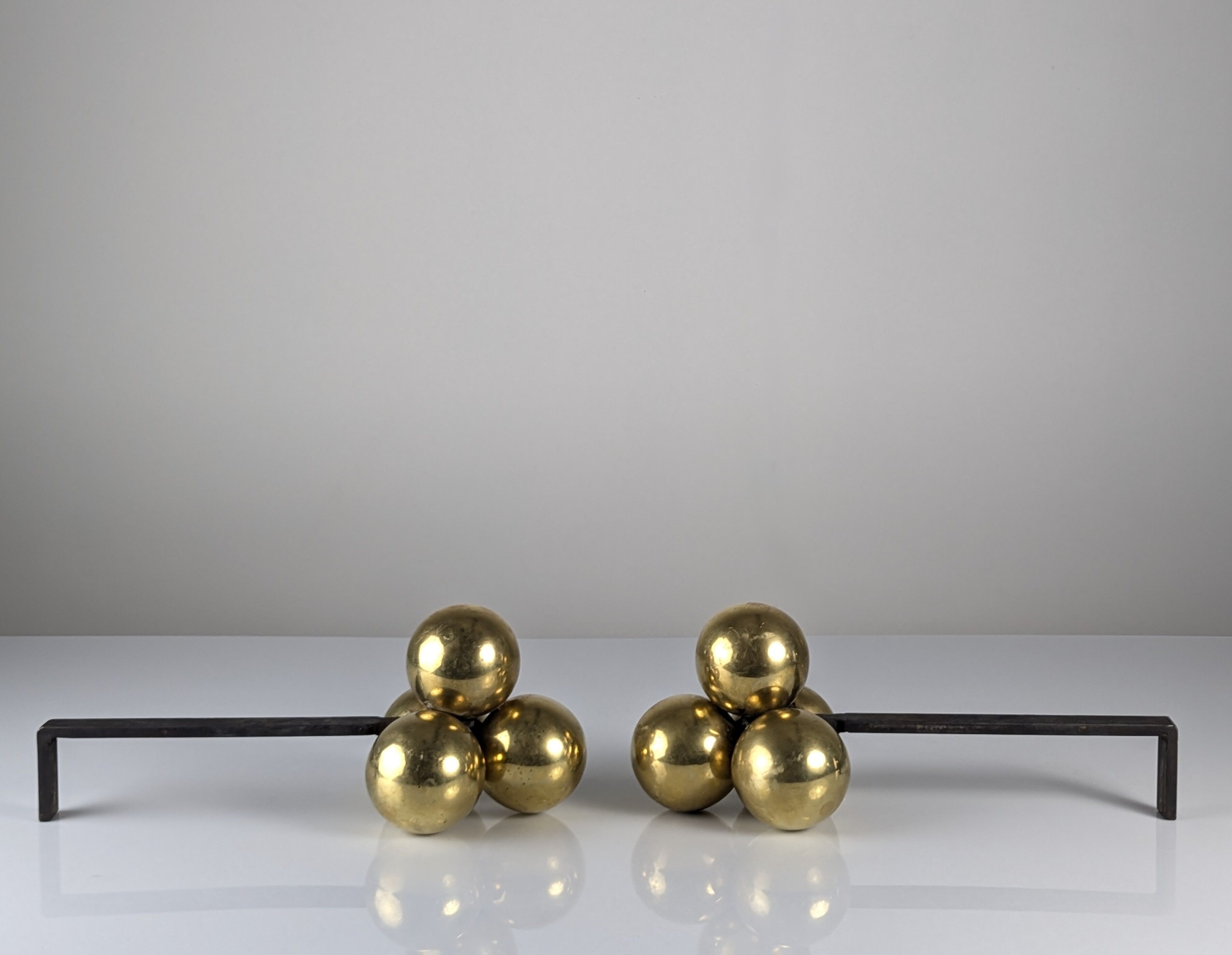 Bronze and wrought iron andirons by Jacques Adnet, 1930s