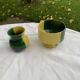 Enameled ceramic bowl and milk jug, two-tone yellow and green, vintage 1950
