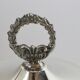 Silver sugar bowl with paw feet and ornate handles