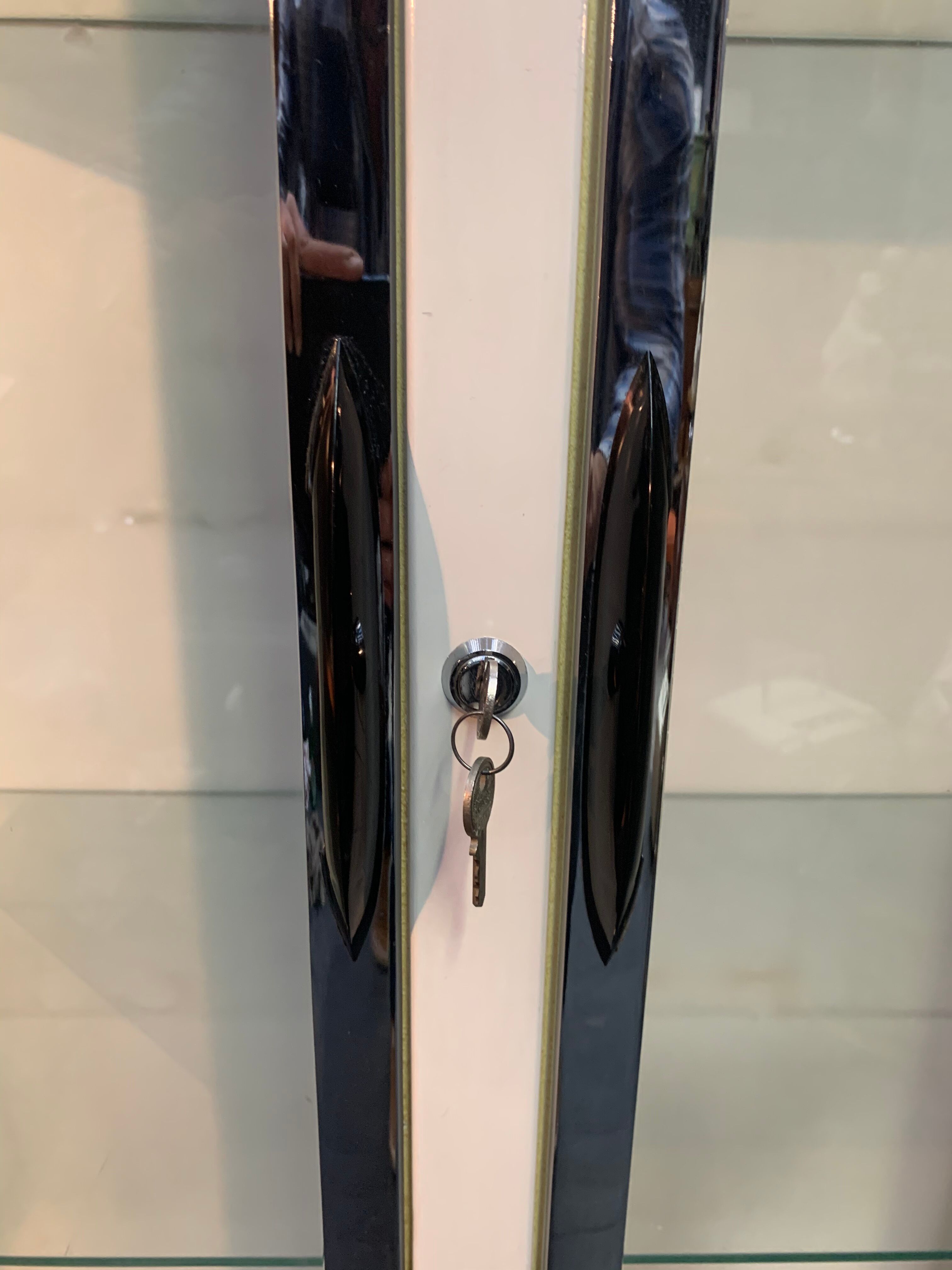 White enamelled metal design showcase. Period 1960