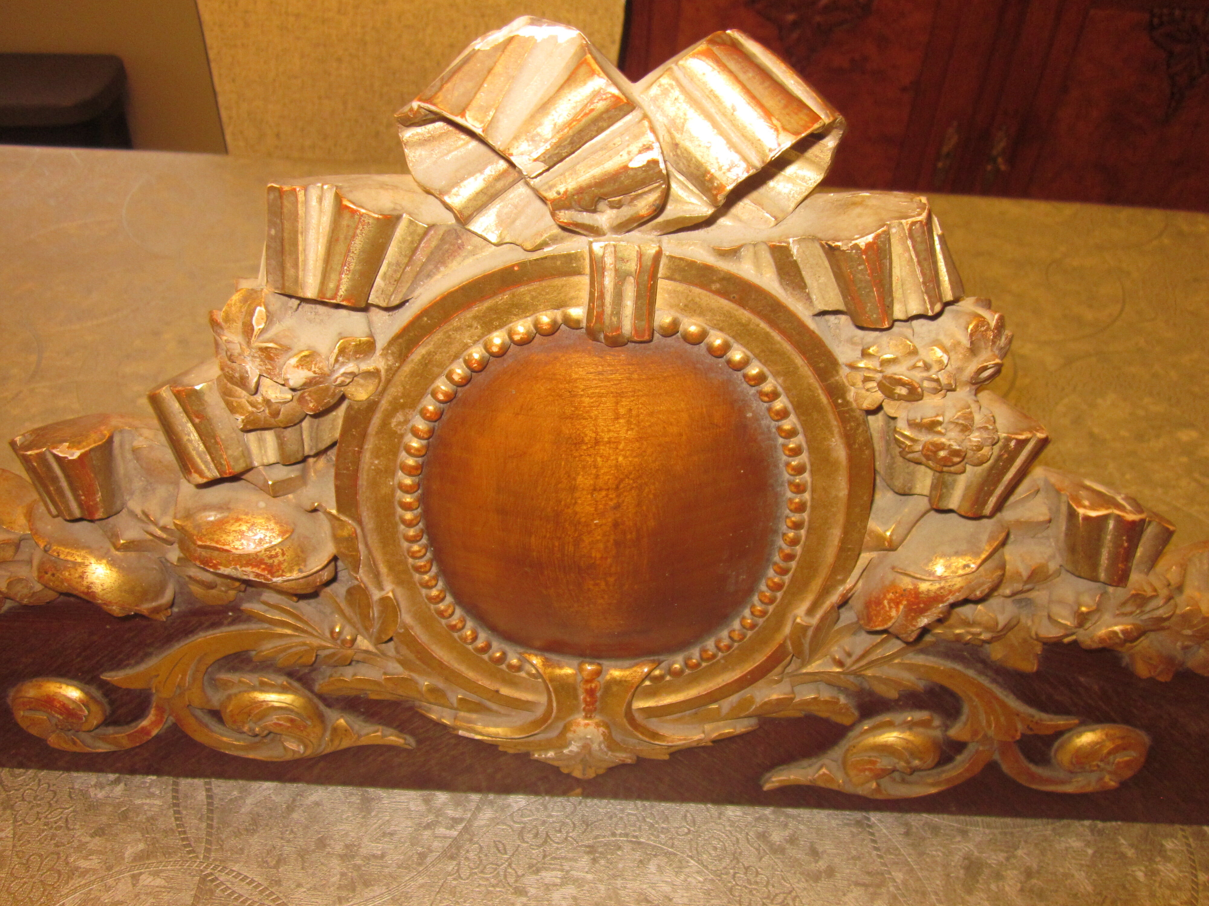 Old wooden pediment stucco