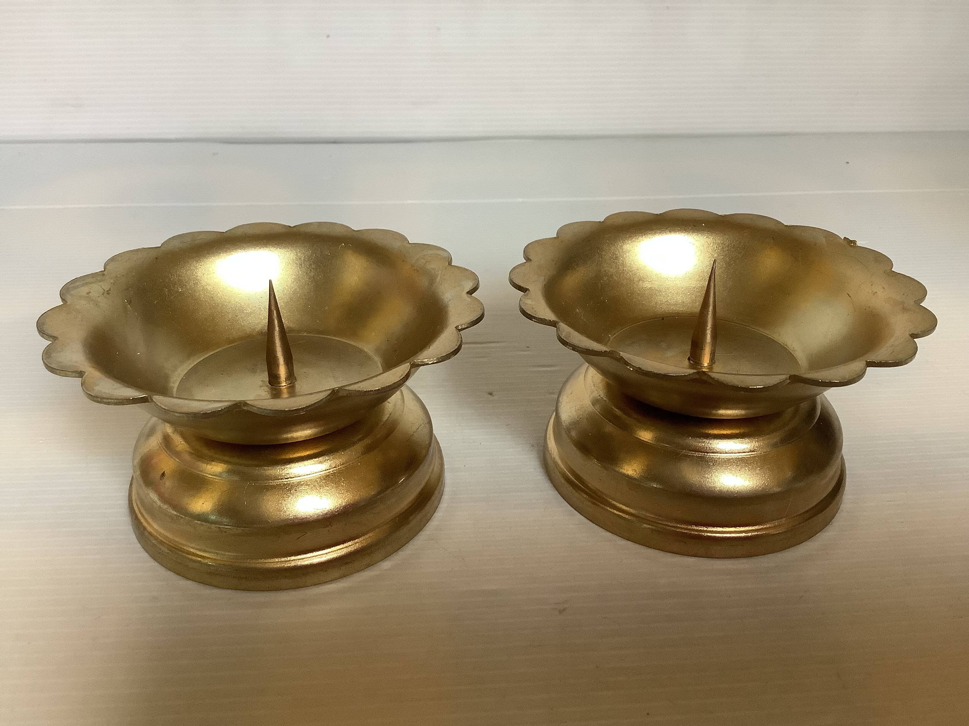 Pair of flower candle holders in gold metal