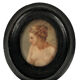 Miniature on medallion porcelain, blackened wooden frame