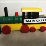 Small vintage train in multicolored wood