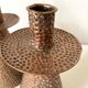 Pair of hammered copper candlesticks from the 1950s