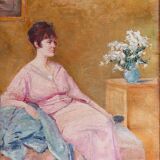 Huile sur toile - non signée - représente une femme assise à côté d'un vase de fleurs.