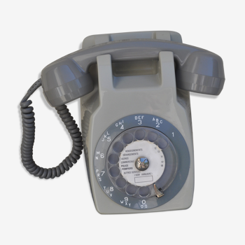 Téléphone vintage gris mural