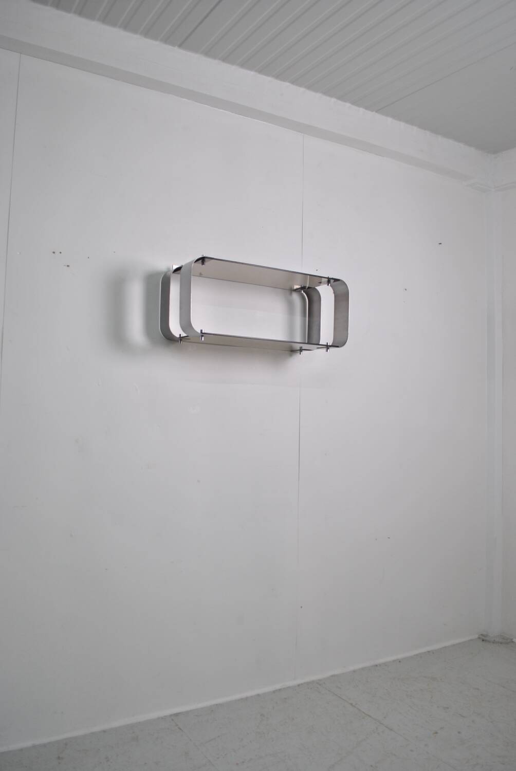 Brushed steel and smoked glass shelf, Donald Singer, 1970