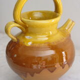 E-mailed terracotta jug or kid.