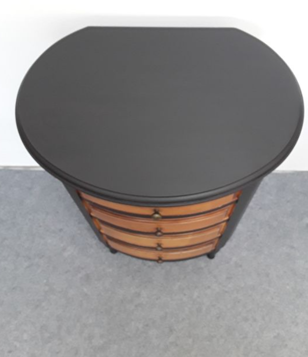 Black drum shape bedside including 4 drawers