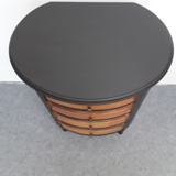 Black drum shape bedside including 4 drawers