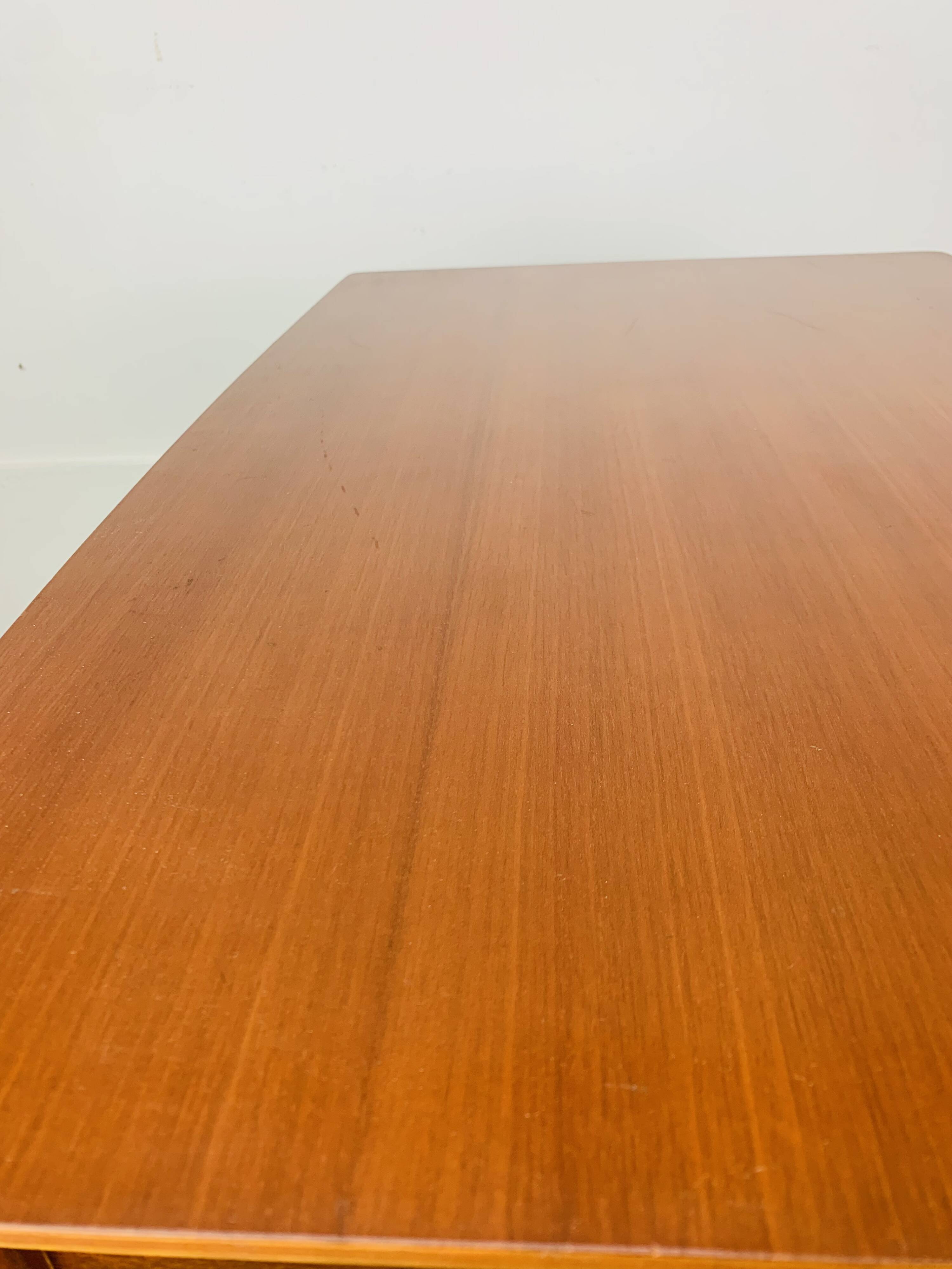 Minimalist Scandinavian teak desk from the 1960s, vintage.