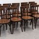 Set of 13 Baumann bistro chairs in bent beech, France circa 1930.
