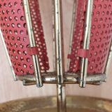 Perforated metal umbrella stand and scoubidou